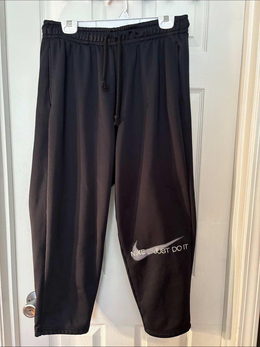 Women’s 1X Nike Black Track Joggers with White Swoosh and 'Just Do It' Text